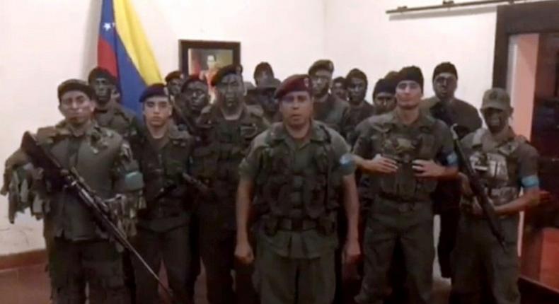 This video screen grab, posted on August 6, 2017, shows a man who claims to be army captain Juan Caguaripano launching his legitimate rebellion against Maduro's tyranny, before his group supposedly raided a Venezuelan army base