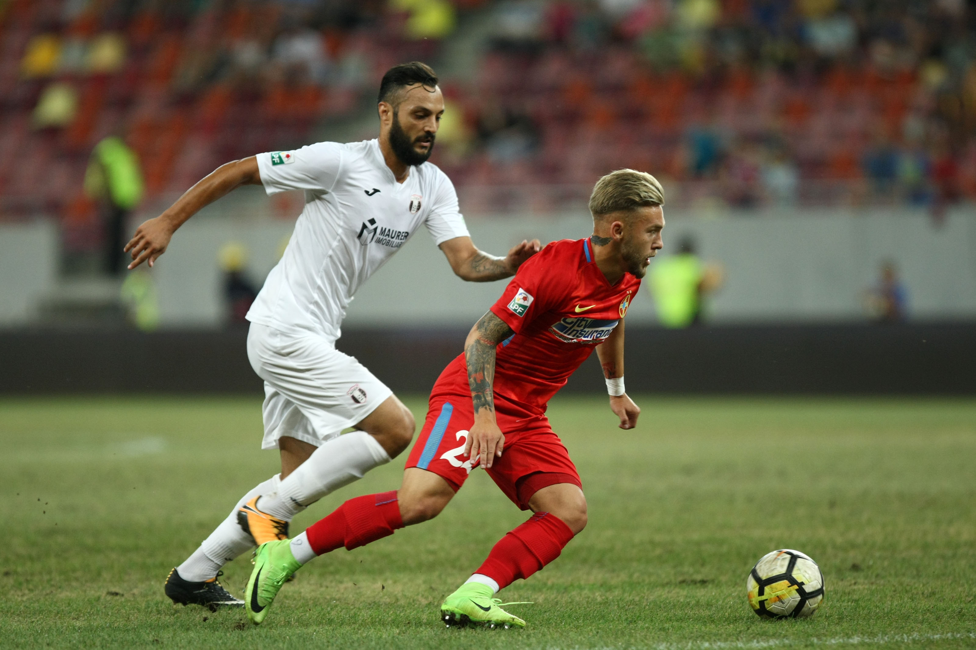 Liga 1, etapa a 6-a: FCSB - Astra 1-1. Conflict între Iordănescu şi Popescu. Teixeira, accidentat. Golofca, gol nevalidat. Gazonul, execrabil. Reacţii | FOTO & VIDEO