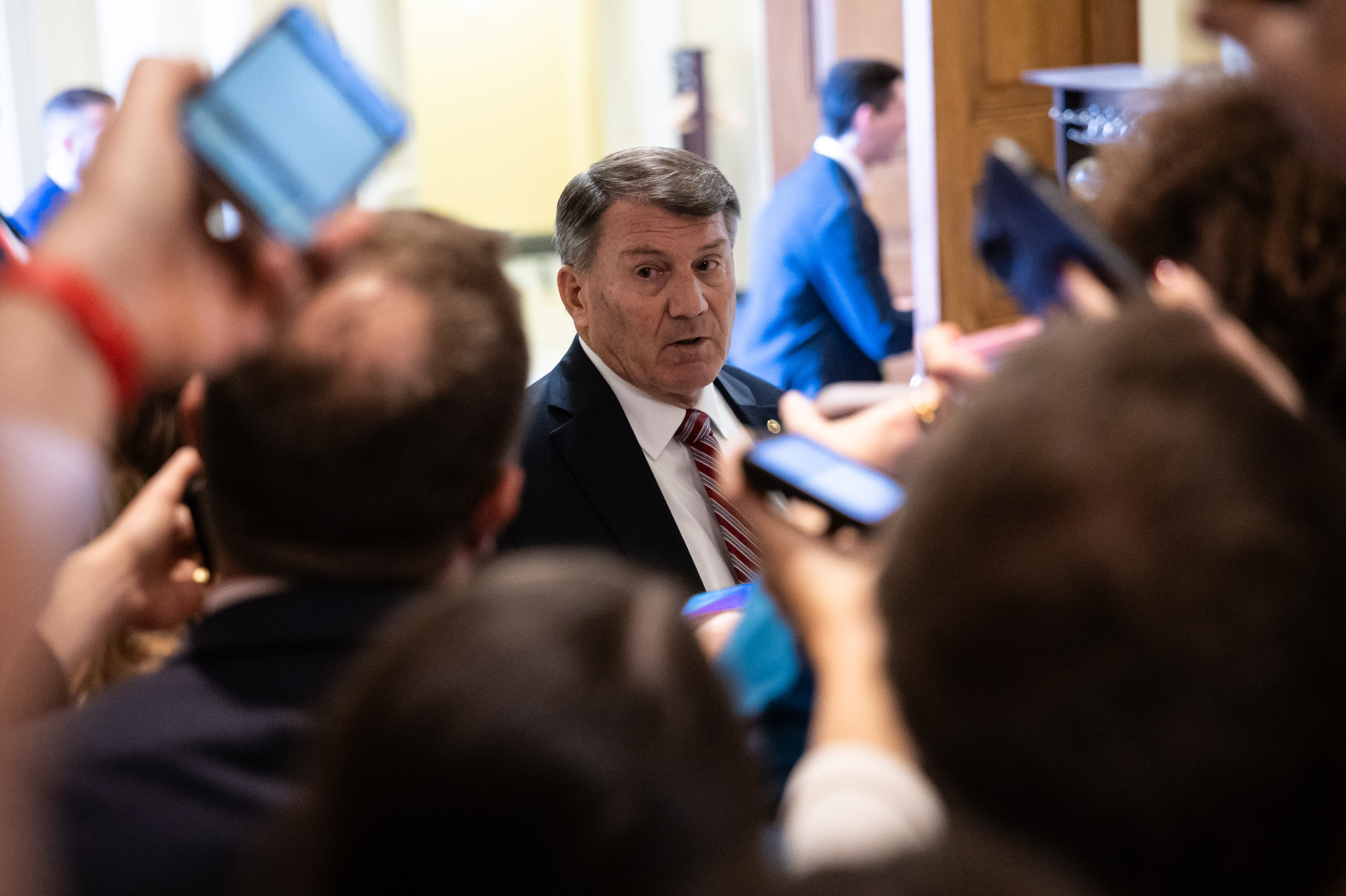Sen. Mike Rounds (R-S.D.) speaks with reporters as he arrives for a Senate Republican Conference meeting at the U.S. Capitol on the 38th day of a government shutdown, Nov. 7, 2025.
