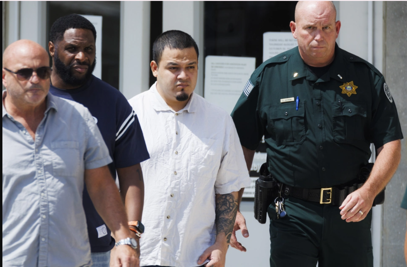 Kilmar Abrego Garcia, second from the right, leaves the Putnam County Jail on Aug. 22, 2025, in Cookeville, Tenn. | Brett Carlsen/AP Photo