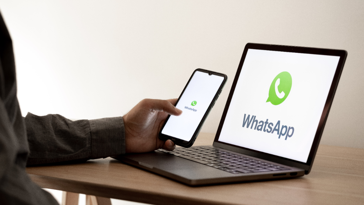The WhatsApp logo appears on a smartphone screen and on a laptop computer screen in this photo illustration in Athens, Greece, on September 17, 2025. [Nikolas Kokovlis/NurPhoto via Getty Images]