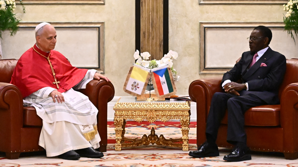 Pope Leo XIV (L) meets with Equatorial Guinea's President Teodoro Obiang Nguema Mbasogo (R) at the Presidential Palace in Malabo on the ninth day of an 11-day apostolic journey to Africa, on April 21, 2026. [Photo by LUCA ZENNARO / POOL / AFP via Getty Images]