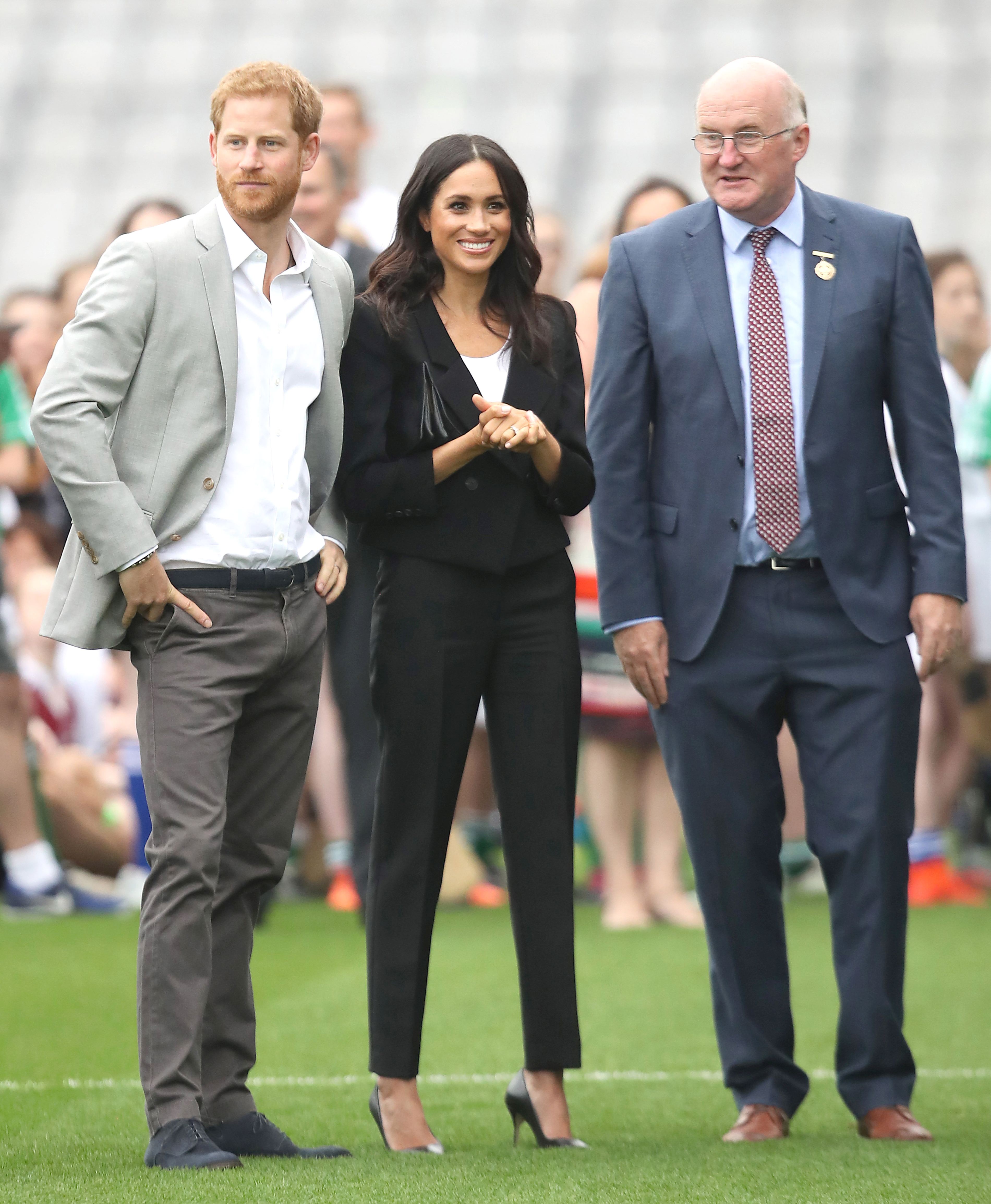FOTO | Meghan Markle, primul turneu regal alături de prințul Harry. A purtat cinci ținute pe parcursul a 24 de ore