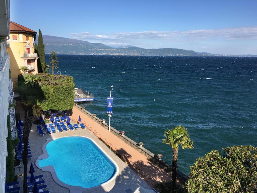 Frații Pavăl, doi dintre cei mai bogați români, cumpără un hotel istoric de pe malul lacului Garda, anunță presa din Italia