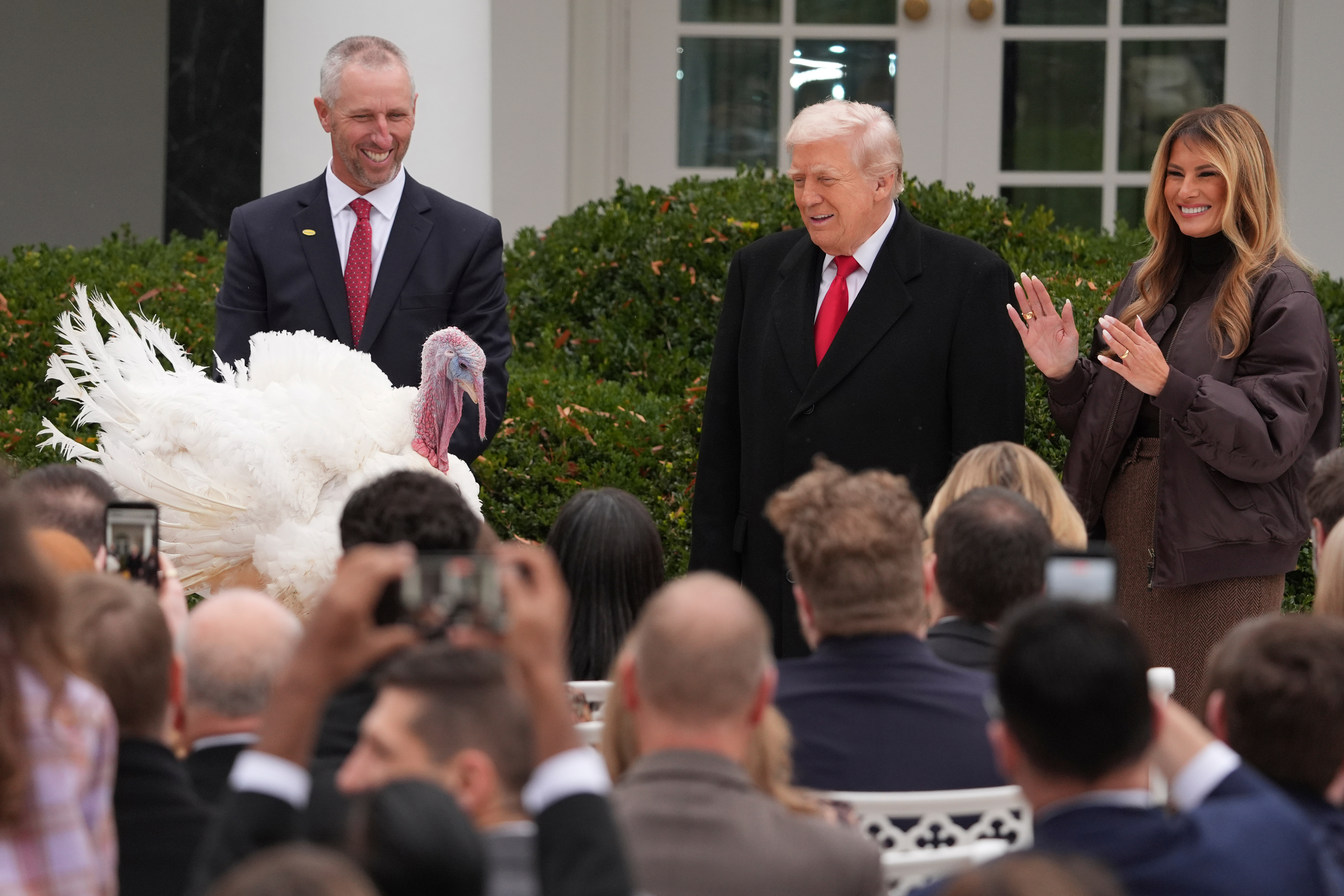 President Donald Trump and first lady Melania Trump stand next to national Thanksgiving turkey Gobble during a pardoning ceremony on Nov. 25. 