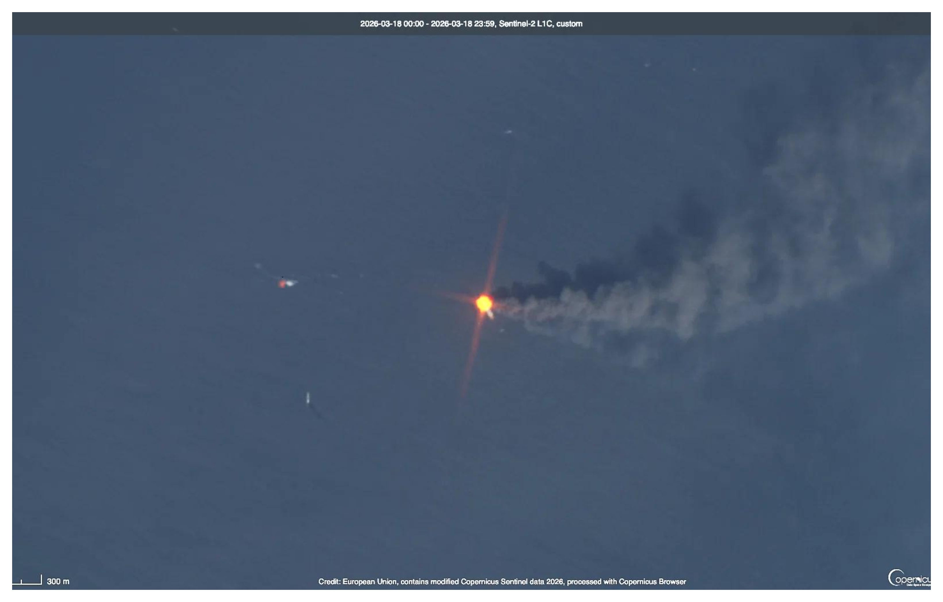 Satellite imagery dated October 14, 2026, shows shipping containers and debris floating near a sunken vessel off Oman, close to the Strait of Hormuz. Photo: European Union/Copernicus Sentinel-2/Handout via Reuters.