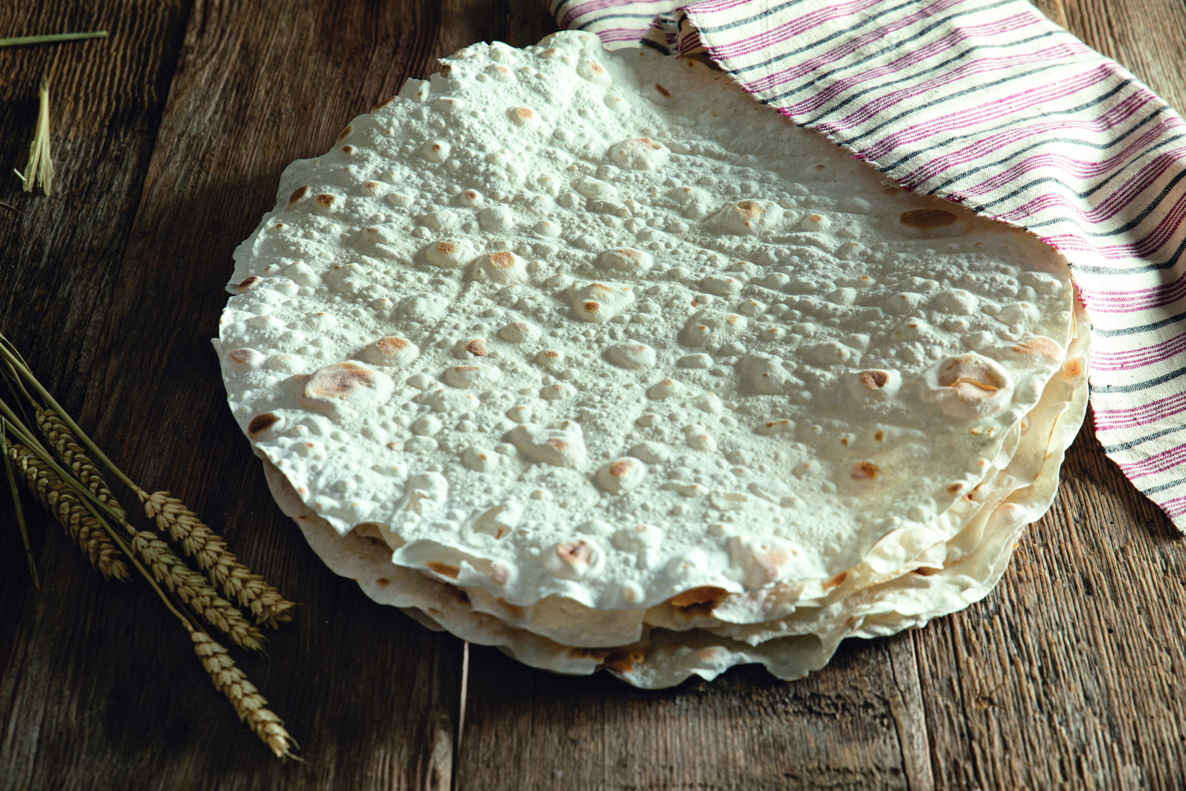 Povestea celei mai vechi pâini din lume. Unde a fost descoperită și ce istorie culinară a scos la iveală