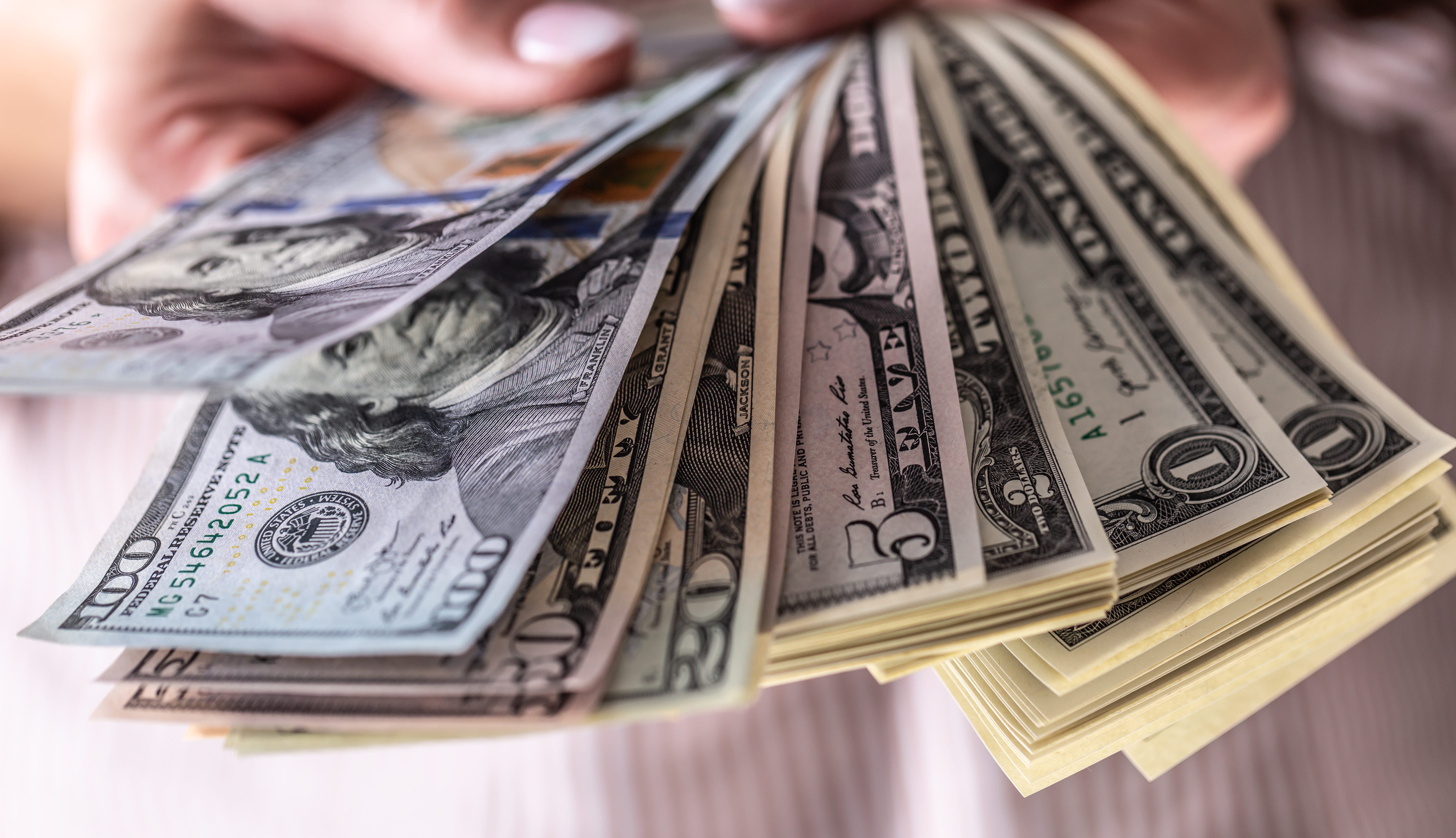 Dollar-denominated real estate prices in Lagos highlight how daily life in Africa remains tied to foreign currency, even as inflation eases.SimpleImages/Getty Image.