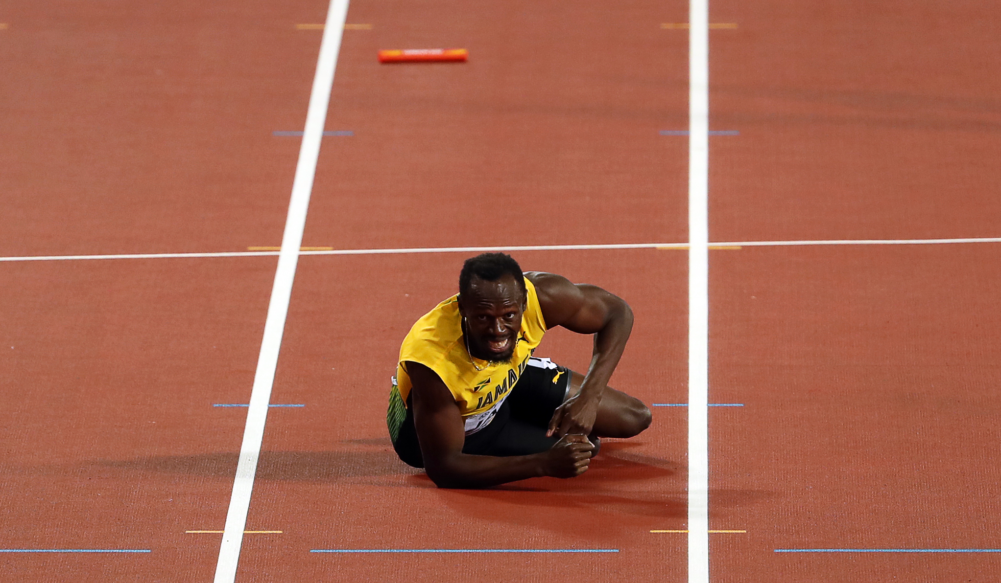 Fiasco Bolt! Marele atlet jamaican s-a accidentat în ultima sa cursă, finala de 4x100 metri de la Mondialele de atletism câștigată de Marea Britanie