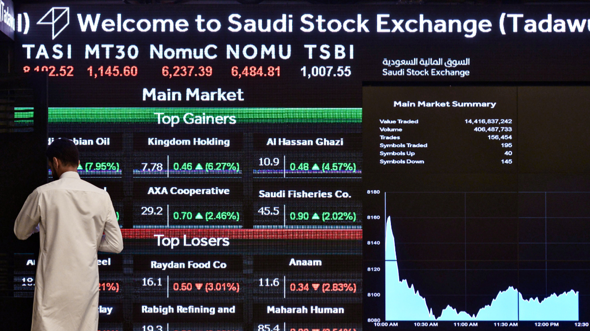 A trader monitor market screen at the Saudi Stock Exchange in Riyadh after authorities announced full access for foreign investors, a move that boosted Gulf equities and drew interest from African markets. [Photo by FAYEZ NURELDINE/AFP via Getty Images]