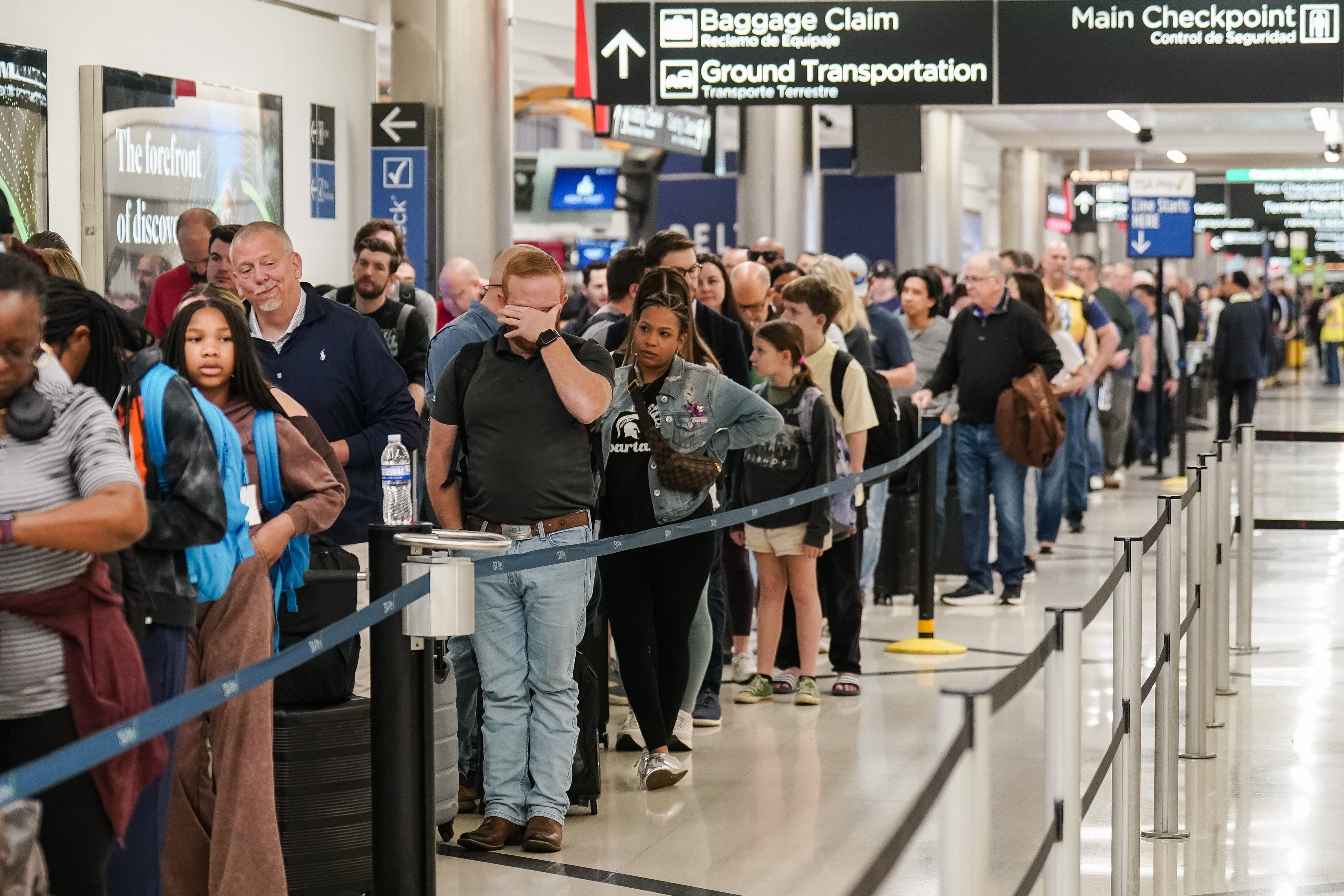 Travelers at US airports are experiencing long wait times at TSA checkpoints.Bloomberg/Contributor/Getty Images