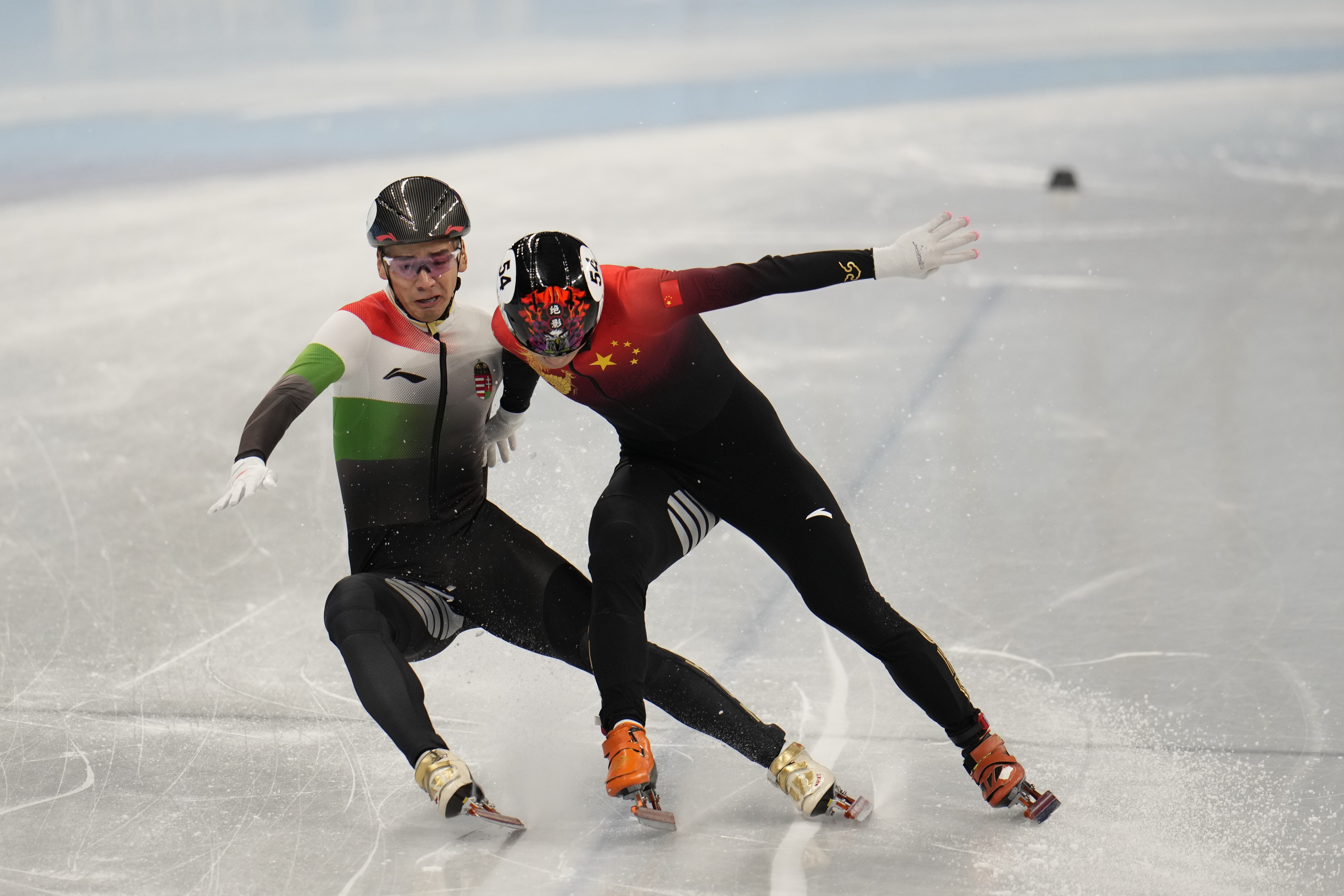 Liu Shaolin (balra) és a kínai Zsen Ce-vej nagy csatát vívott, hiába ért elsőként a célba a magyar versenyző, az ellenfele nyerte az olimpiát / Fotó: Getty Images