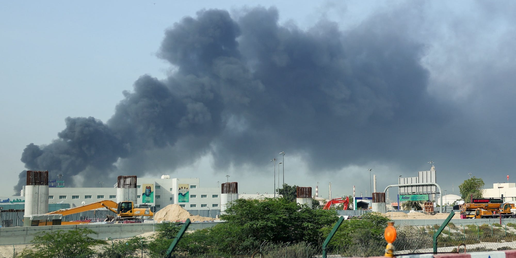 Smoke billowed from Dubai's Jebel Ali port after an Iranian attack. Authorities pointed to shrapnel from an aerial interception.Raghed Waked/REUTERS