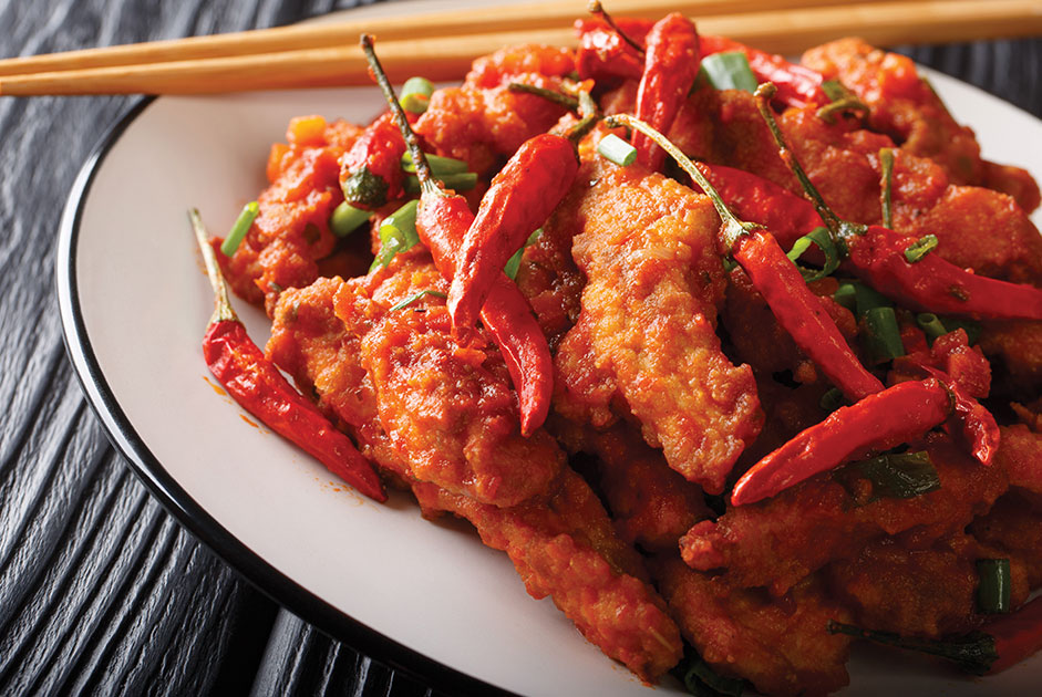 Spicy foods can irritate the lining of your stomach [ForsythWoman]