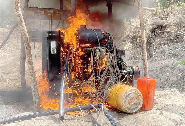 Small-scale miners burn galamsey equipment on River Mankraso in Ahafo Ano South