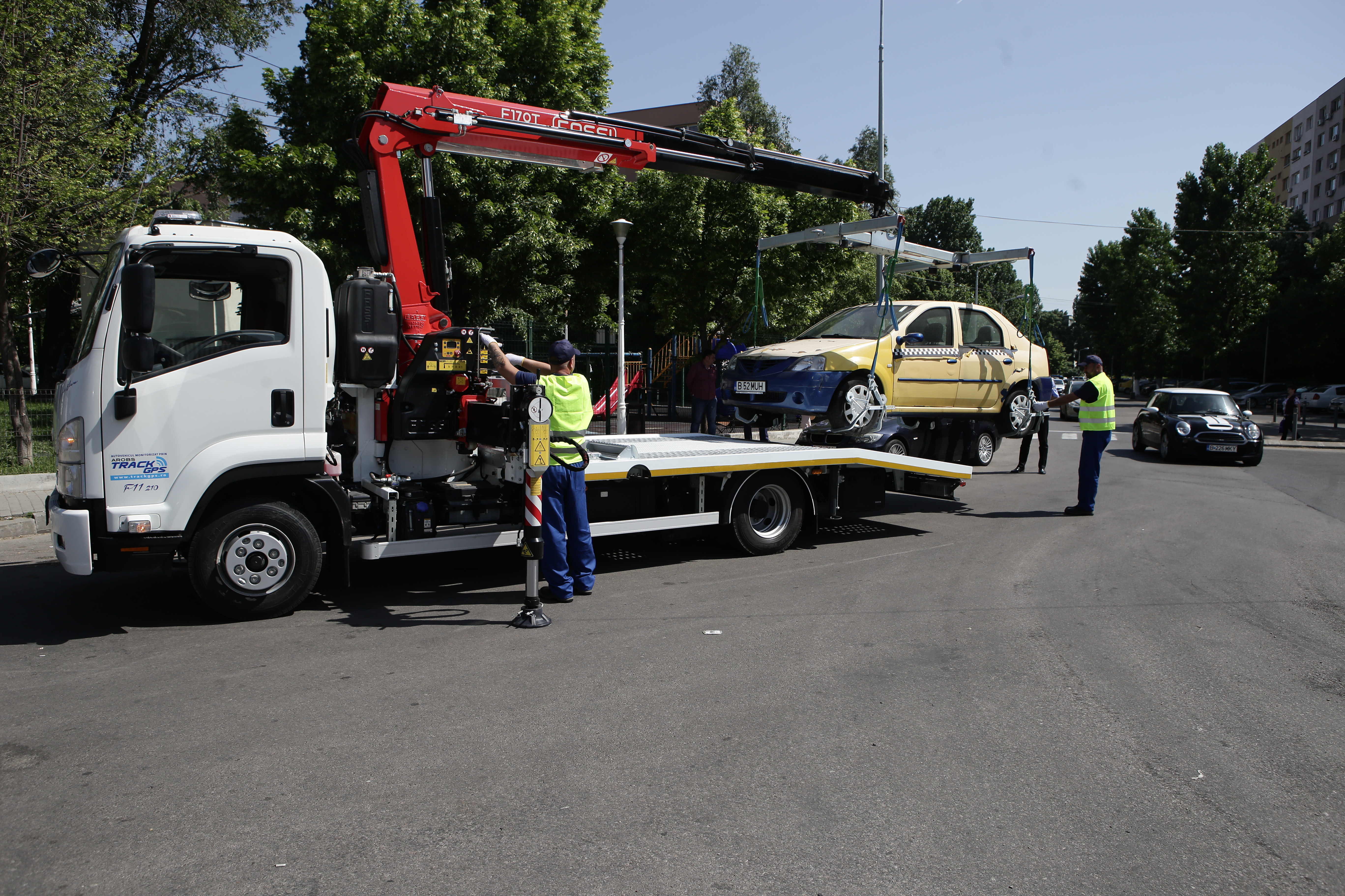 REPORTAJ / Cum se ridică mașinile în sectorul 3 din București