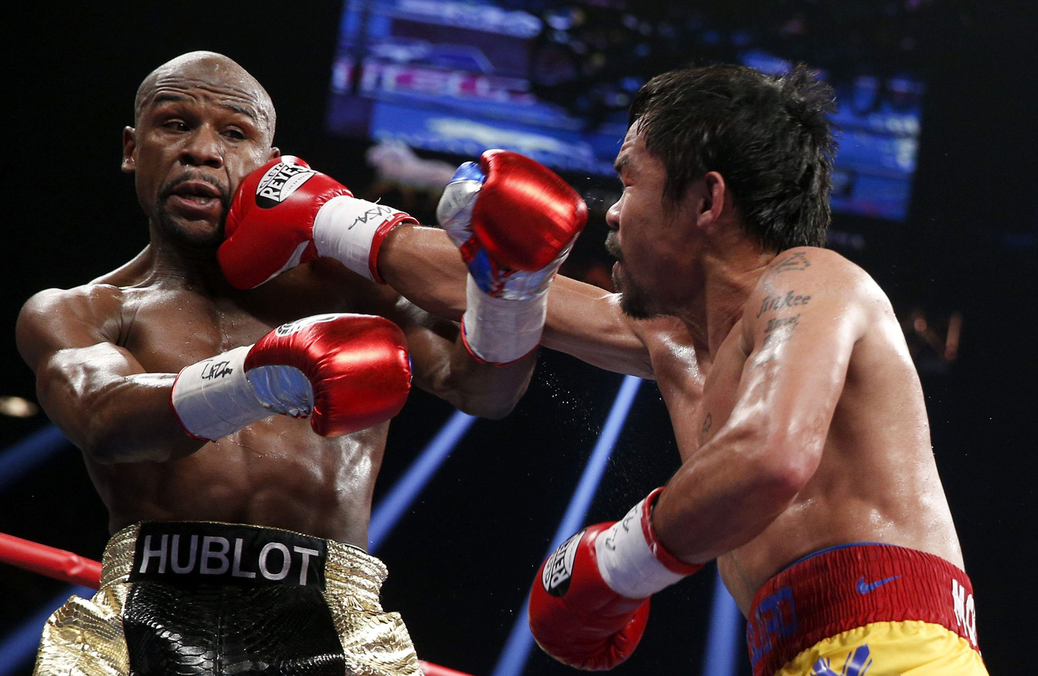 MAYWEATHER l-a bătut la puncte pe PACQUIAO. Lupta a dezamăgit! / FOTO