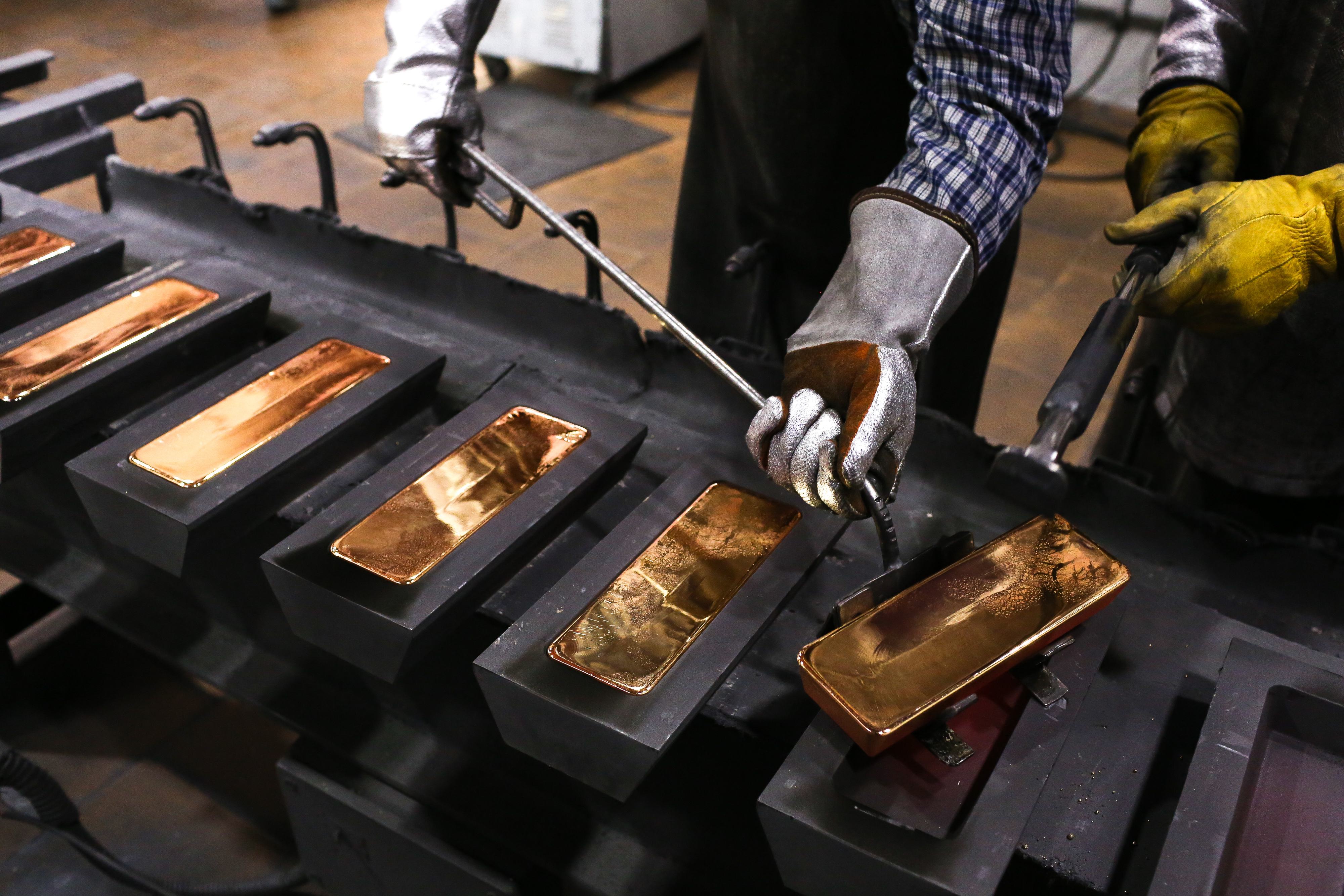 Gold ingots: Canadian miner Stellar AfricaGold is expanding drilling operations after promising early results at the Tichka Est permit. [Photo by Andrey Rudakov/Bloomberg]