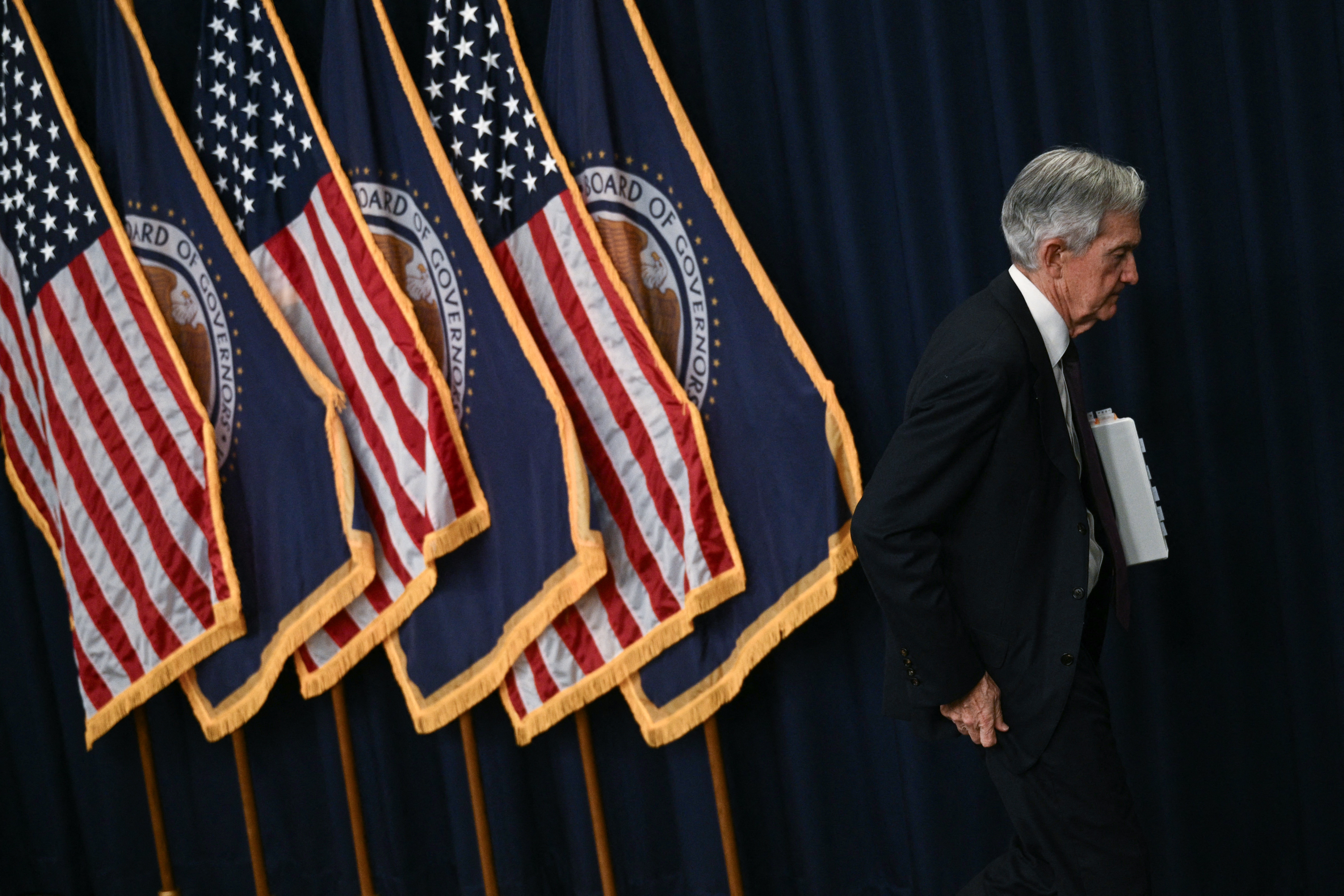 Federal Reserve Board Chair Jerome Powell departs at the end of a news conference following a Federal Open Market Committee meeting at the Federal Reserve in Washington, May 7, 2025.