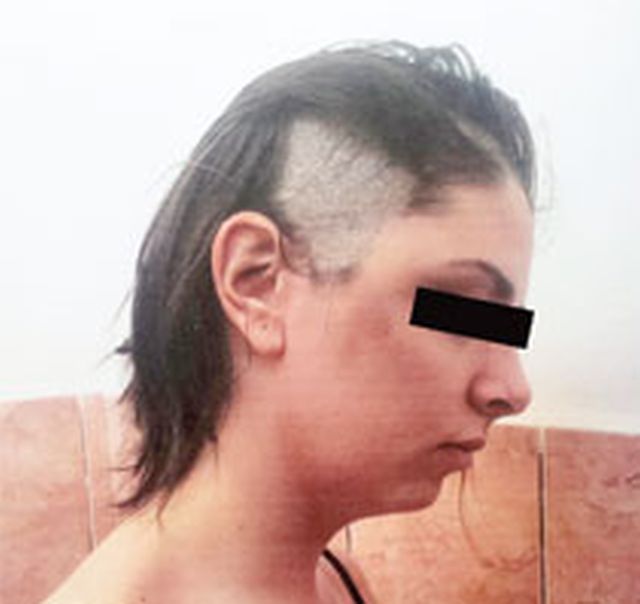 Şi-a bătut fiica şi a tuns-o cu un cuţit ca să o facă de râs la şcoală! GALERIE FOTO