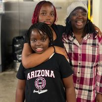 Jerida Andayi and her daughters Neema and Norah