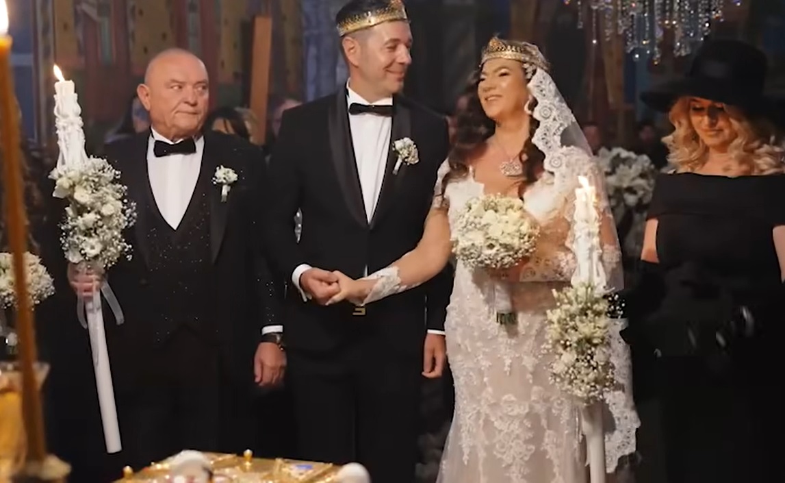Imagini nevăzute până acum de la nunta Mihaelei Borcea cu Sorin Rap. Gestul făcut de îndrăgostiți în biserică a fost surprins de fotografi