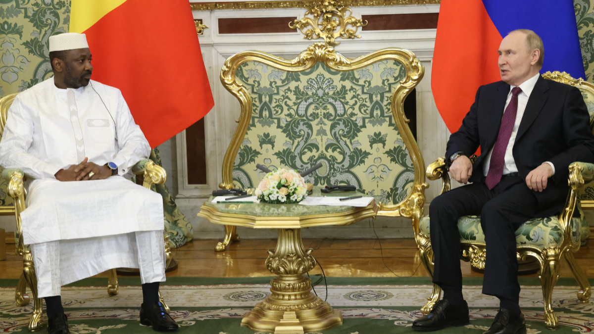 Russian President Vladimir Putin (R) talks to interim Malian President Assimi Goita (L) during their meeting at the Grand Kremlin Palace, June 23, 2025, in Moscow, Russia. [Photo by Contributor/Getty Images]
