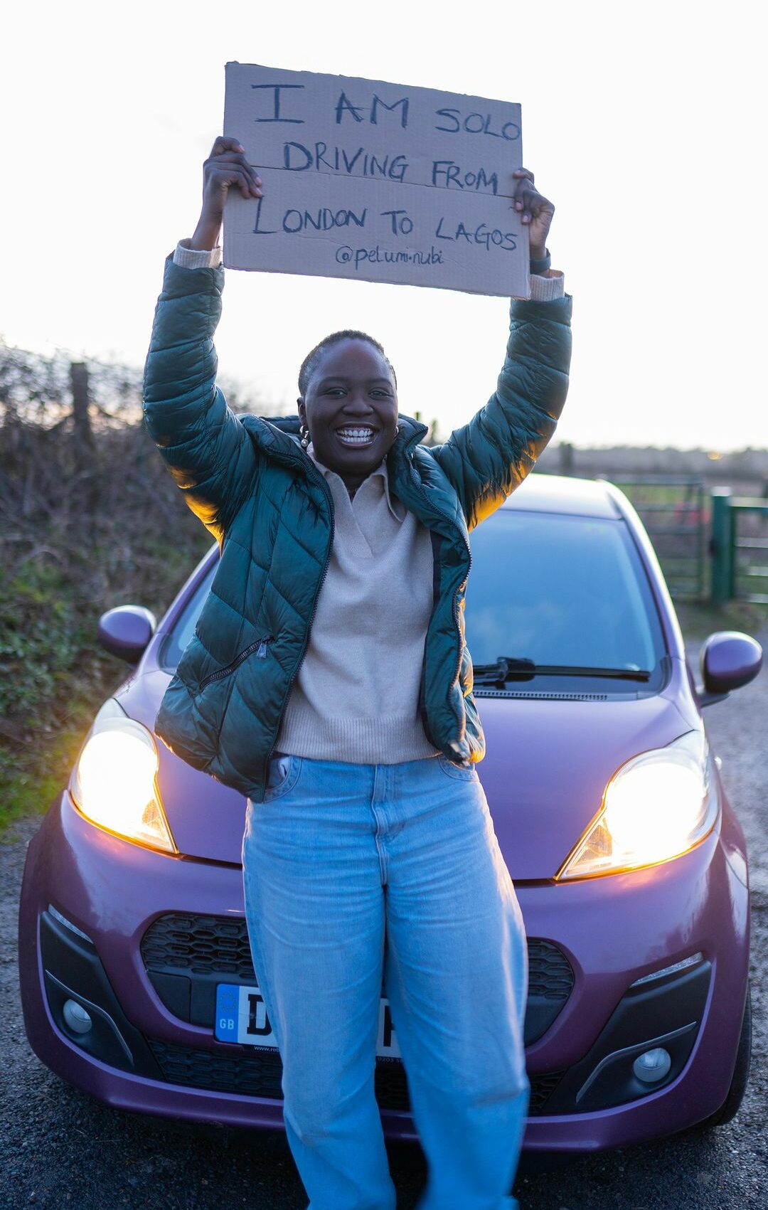 Pelumi Nubi arrives in Lagos after driving from London to Lagos