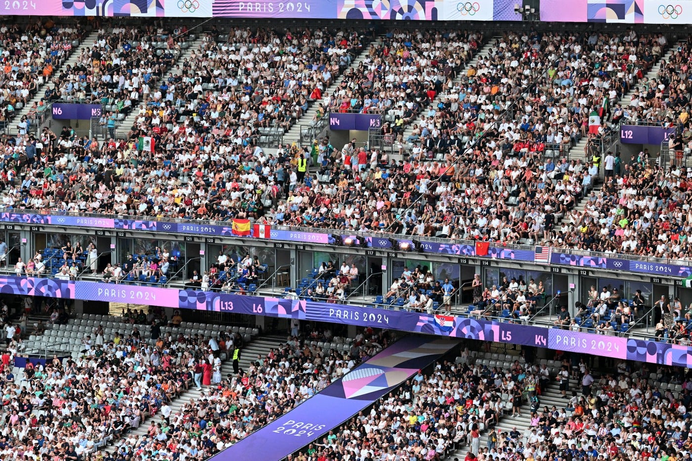 Jocurile Olimpice s-au încheiat cu o ceremonie spectaculoasă pe Stade de France. Tom Cruise a preluat ștafeta, după o cascadorie inspirată din filmele „Misiune Imposibilă”