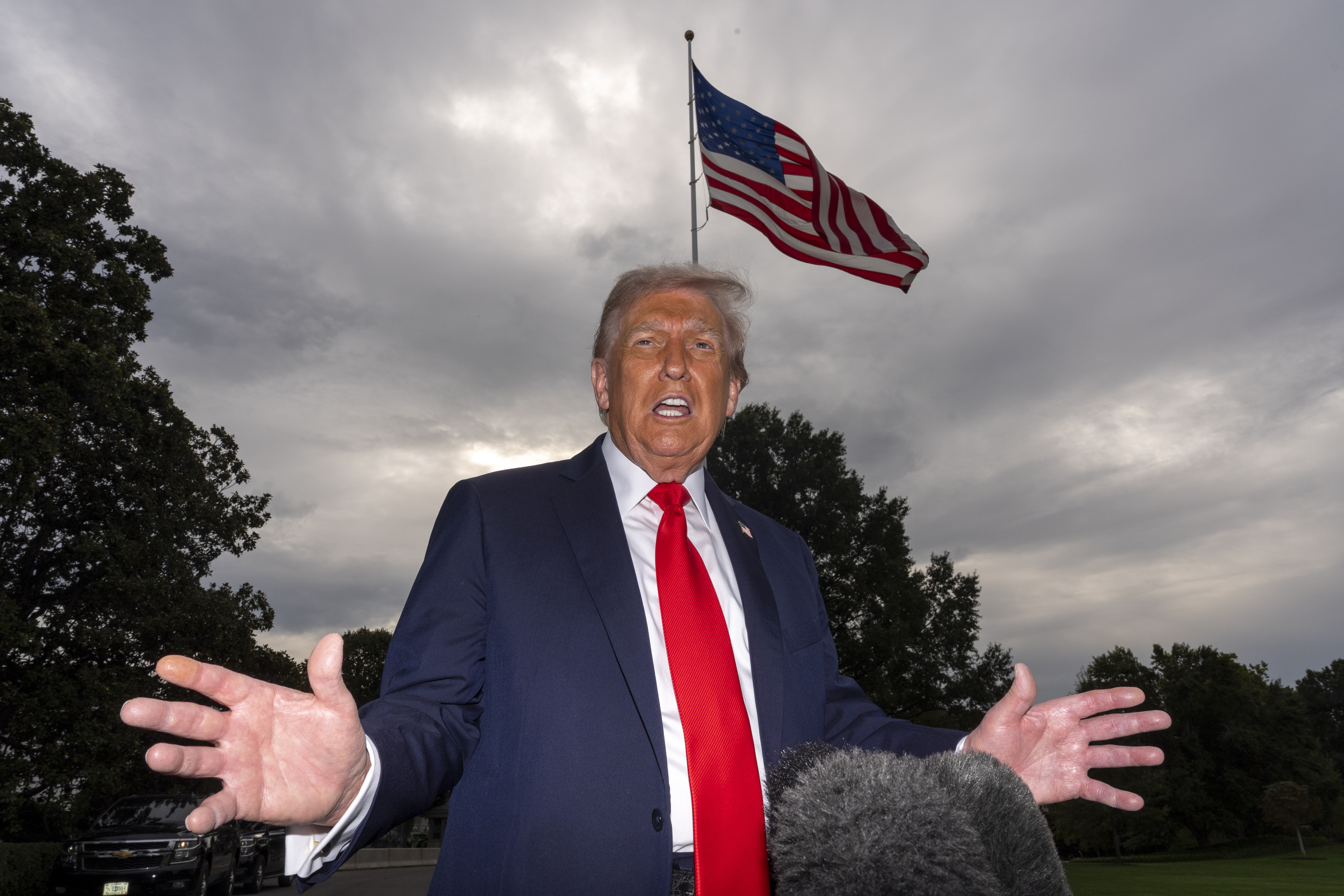 President Donald Trump speaks with reporters before departing on Marine One from the South Lawn of the White House, Tuesday, Sept. 16, 2025, in Washington.