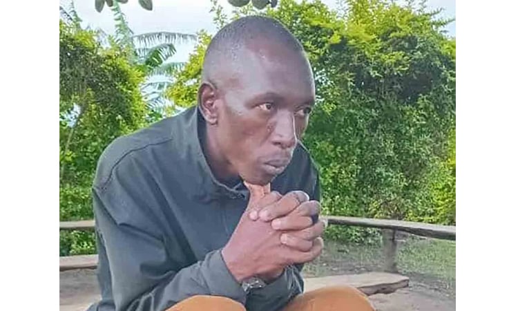 Derrick Memory, the primary suspect in the 2019 abduction of American tourist Kimberly Sue Endicott, photographed following his arrest in Uganda's Kanungu District on May 4, 2025. Authorities report that Memory had been evading capture for six years, allegedly hiding in eastern Democratic Republic of Congo and engaging in criminal activities before re-entering Uganda.