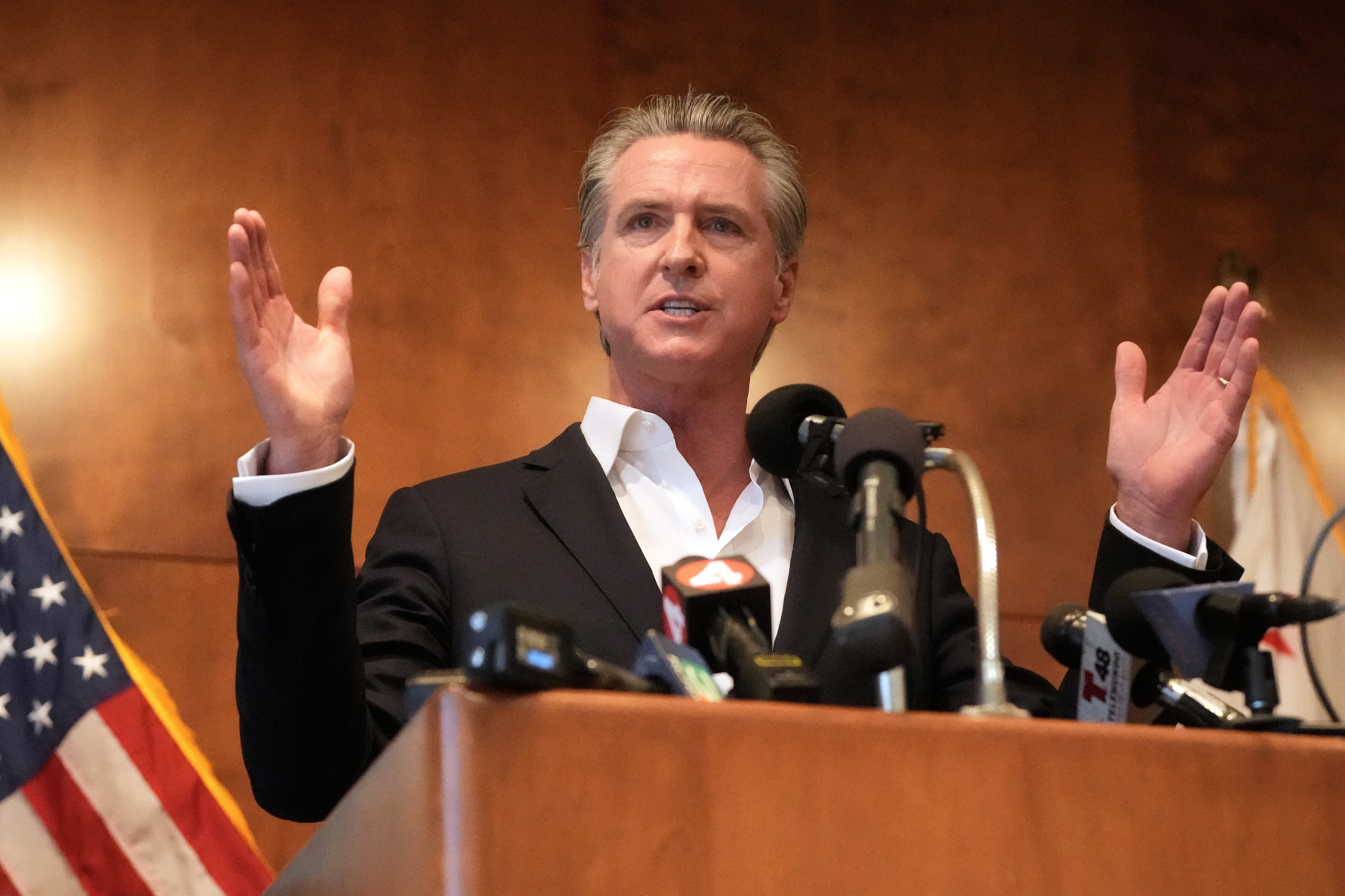 California Gov. Gavin Newsom, pictured here during a recent redistricting campaign event, is nudging lawmakers and tech back together.