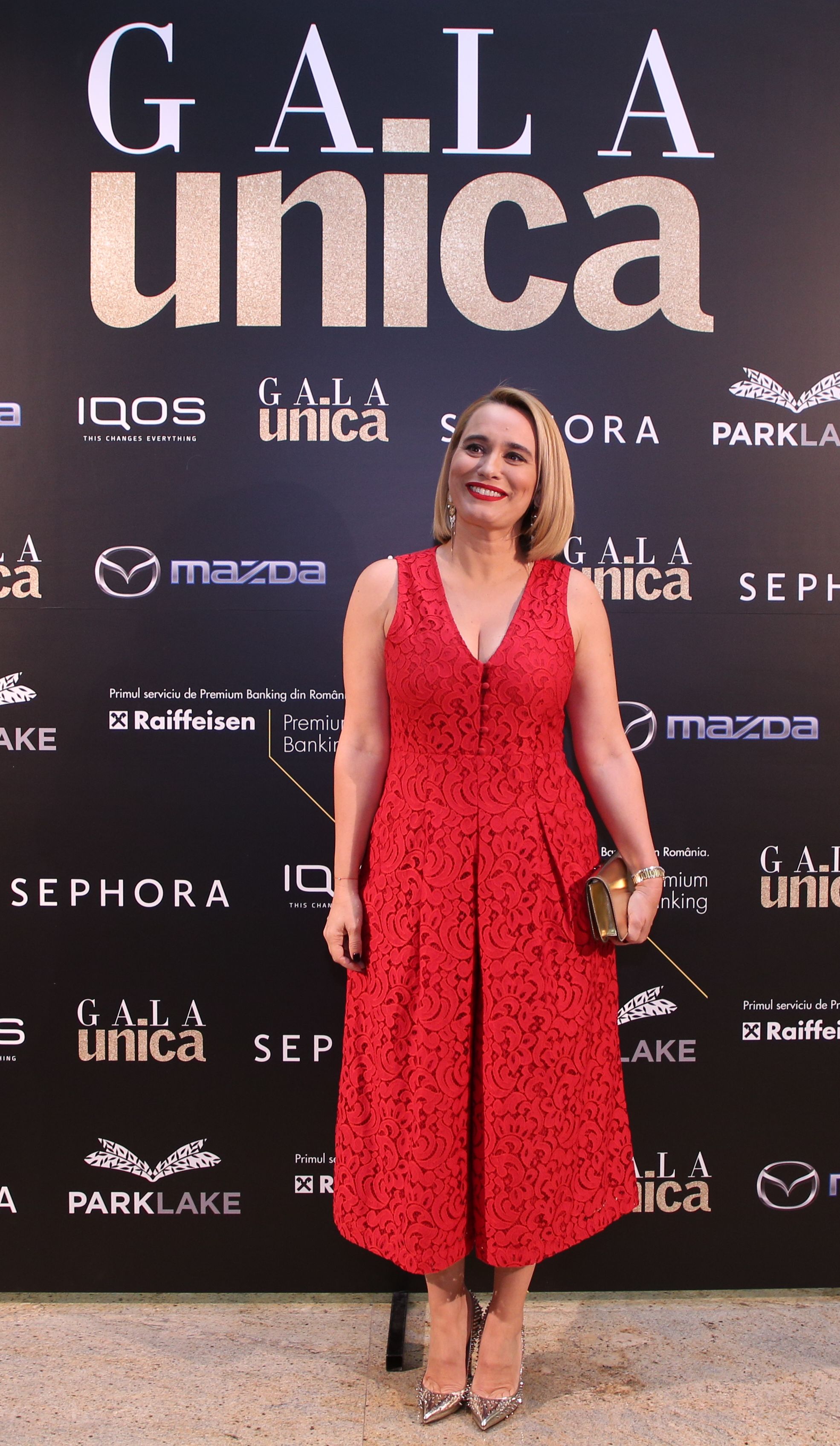 Lady in Red. Andreea Esca și obsesia ei pentru roșu! Rochiile cu care vedeta PRO TV se afișează de câțiva ani