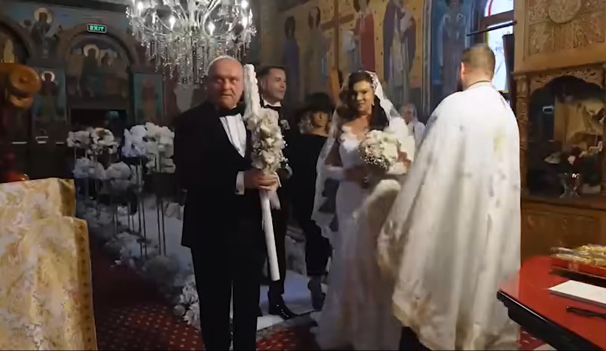 Imagini nevăzute până acum de la nunta Mihaelei Borcea cu Sorin Rap. Gestul făcut de îndrăgostiți în biserică a fost surprins de fotografi