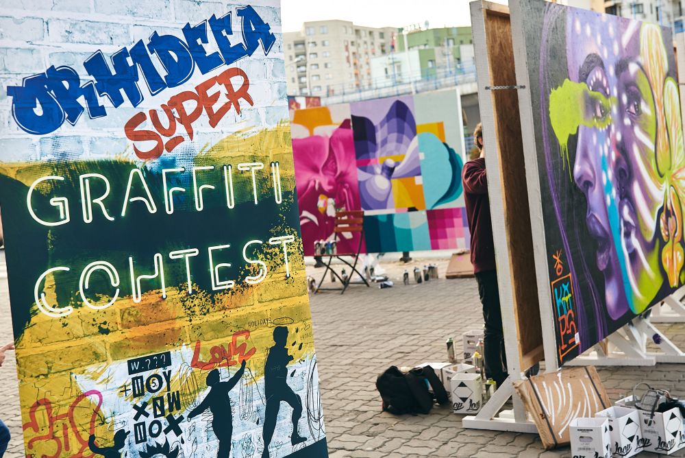 6 trupe de artisti urbani s-au duelat in opere de graffiti in parcarea Centrului Comercial Orhideea! Cei mai cunoscuti grafferi din Romania au jurizat spectaculosul concurs!