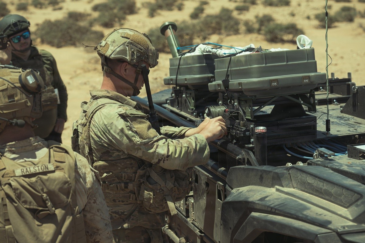 A U.S. Army combat engineer mounts a rocket-propelled line charge system onto an autonomous ground platform during African Lion 26 in Tan-Tan, Morocco, on April 30, 2026. (Photo by Sgt. C’Jay Spence/U.S. Army)