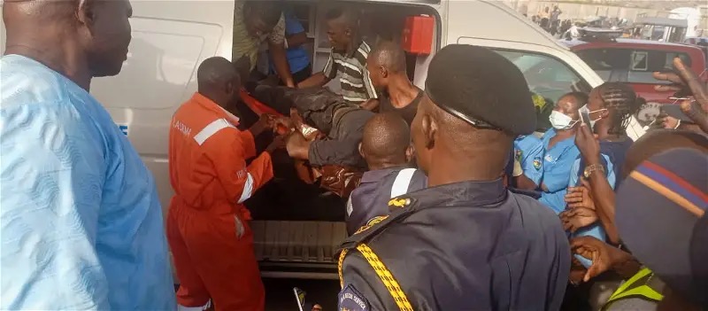 Emergency workers rescue petrol attendant who fell into underground tank