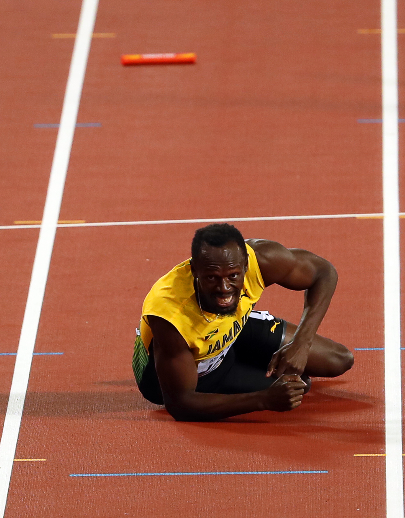 Fiasco Bolt! Marele atlet jamaican s-a accidentat în ultima sa cursă, finala de 4x100 metri de la Mondialele de atletism câștigată de Marea Britanie