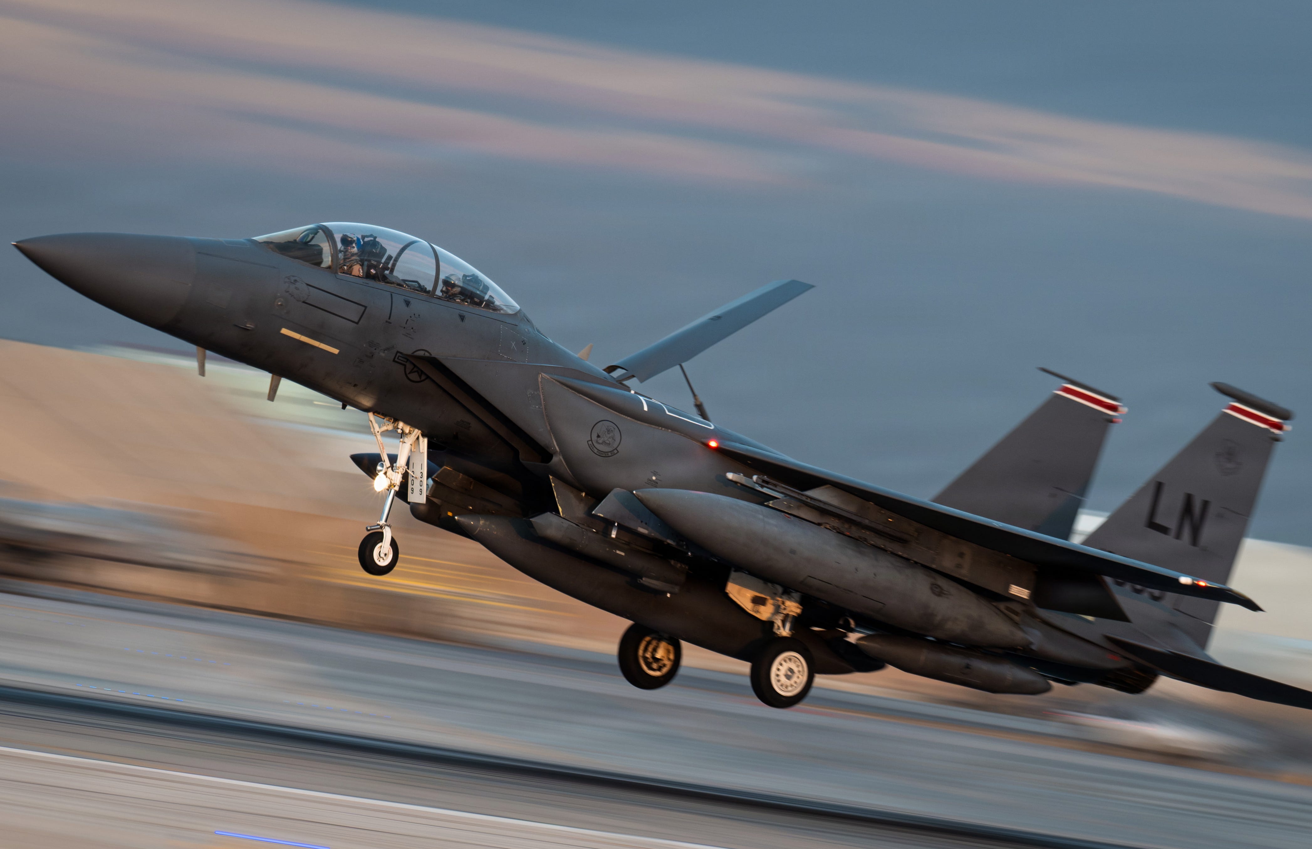 A U.S. Air Force F-15E Strike Eagle aircraft prepares to land at a base in the Middle East, Jan. 18, 2026. The F-15E Strike Eagle is a dual-role fighter designed to perform air-to-air and air-to-ground missions at low altitude, day or night and in all weather.U.S. Air Force photo by Senior Airman Jonah Bliss