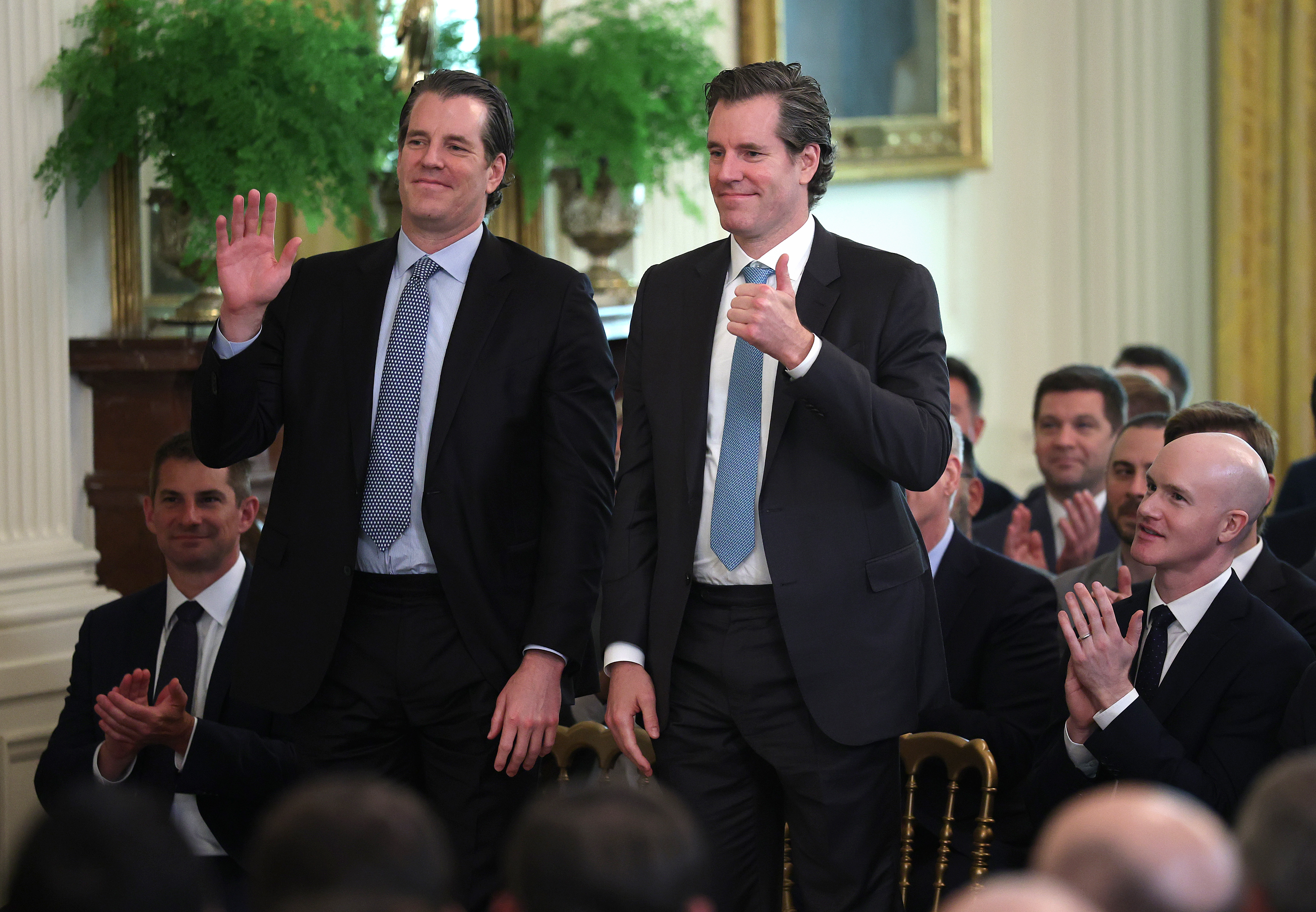 Cryptocurrency billionaire Tyler Winklevoss (left) has raised concerns that President Donald Trump's pick to run the Commodity Futures Trading Commission is not aligned with his agenda. Cameron Winklevoss is at right.