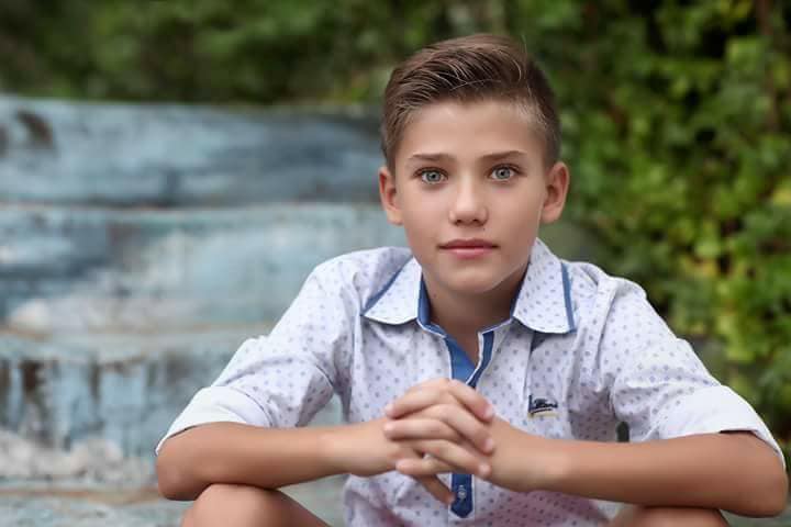 REPORTAJ/ A fascinat o lume întreagă cu ochii lui albaștri. Mario Busuioc, cel mai frumos băiețel al planetei, se visează chirurg, inginer sau navigator. FOTO