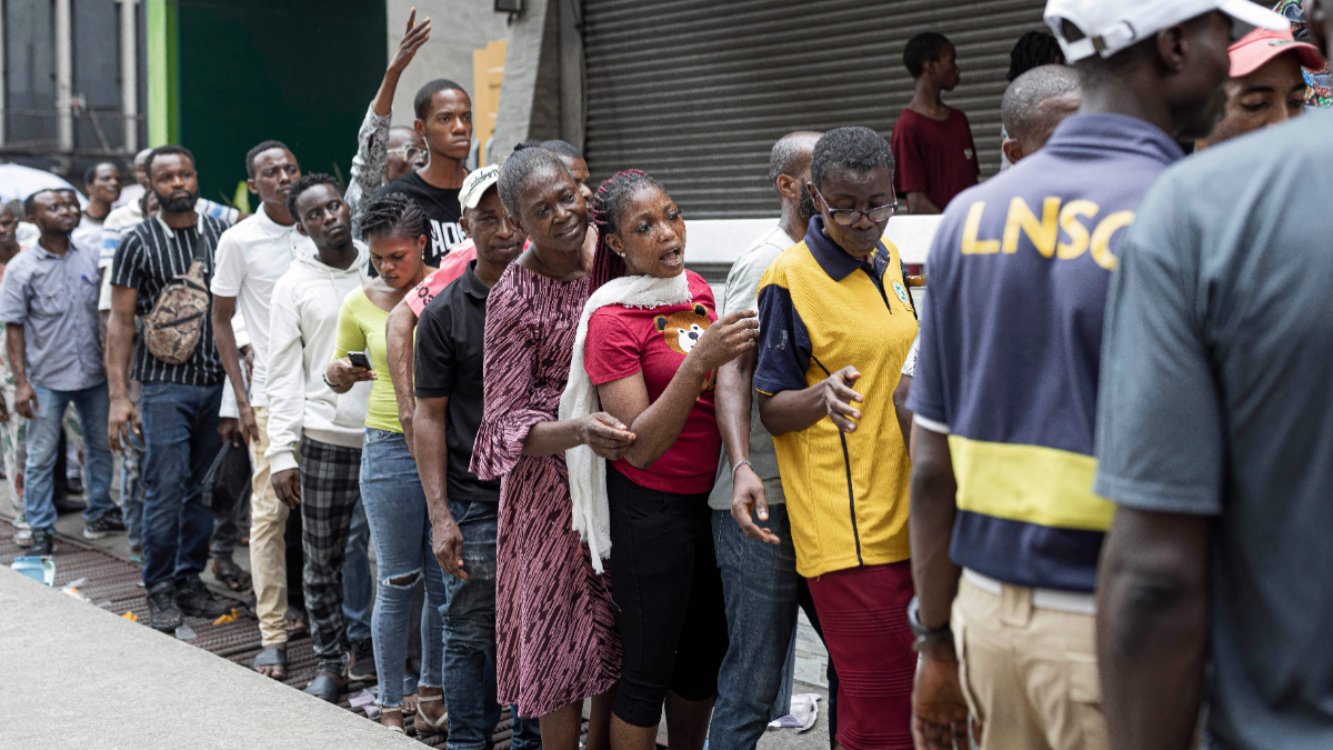 People queue outside a bank in Lagos on February 22, 2023 during the cash crunch saga. [Getty Images]