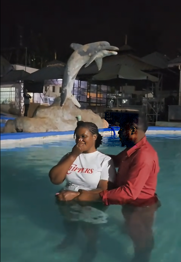 TikToker Cindy Baibe during her baptism by Apostle Ray Michael