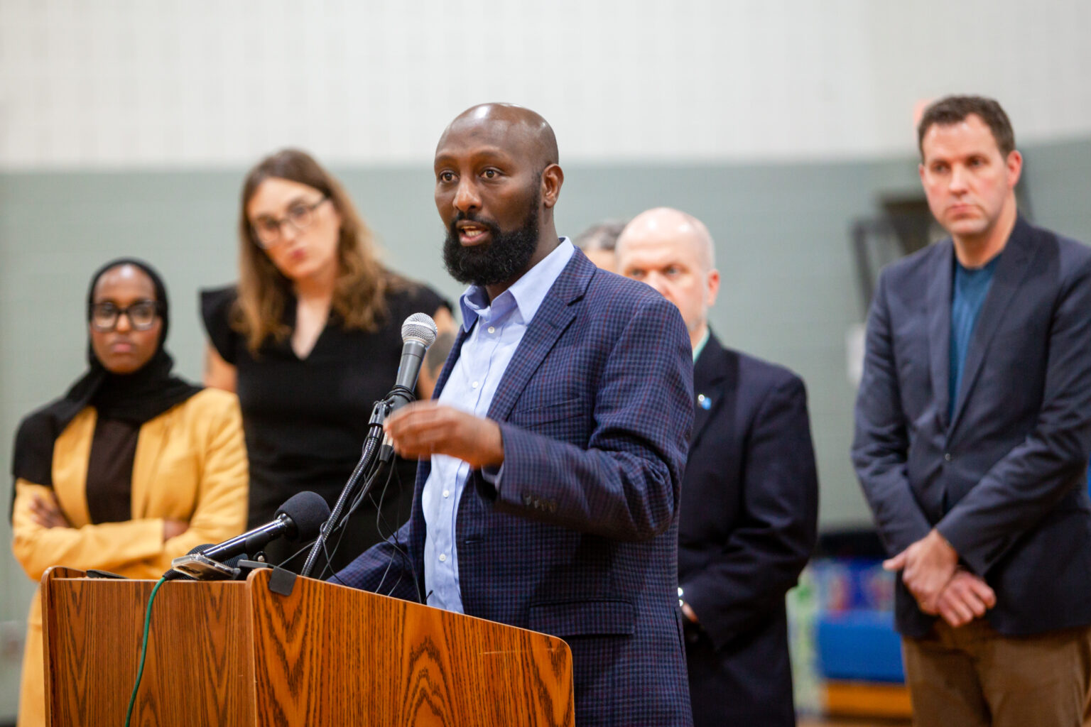 Rep. Mohamud Noor, flanked by DFL lawmakers and other community leaders, speaks during a press conference addressing reports of an increased ICE presence specifically targeting Somali people and denouncing xenophobic remarks President Donald Trump made about the Somali community Wednesday, Dec. 3, 2025. (Photo by Nicole Neri/Minnesota Reformer)