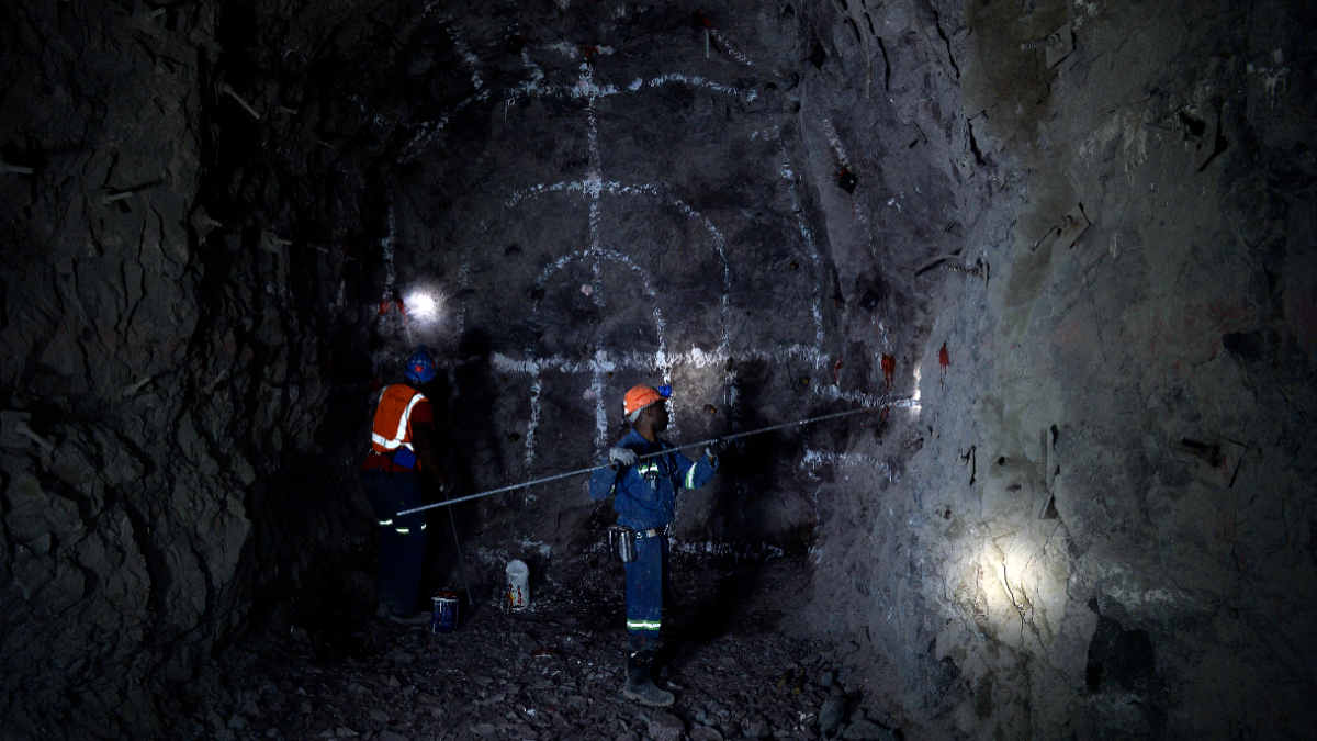 Miners work on October 10, 2013 at the Cullinan Diamond Mine, 100 kms north-east of Johannesburg. [Photo by STEPHANE DE SAKUTIN/AFP via Getty Images]