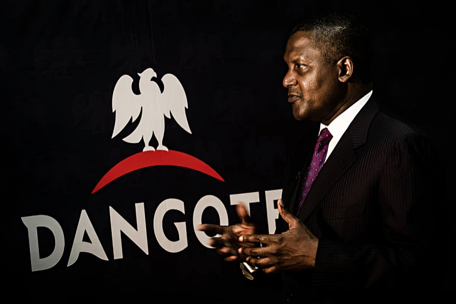 Billionaire Aliko Dangote, chief executive officer of Dangote Group, speaks to journalists after a Sallah visit to President Bola Tinubu in Lagos, where he warned that Middle East tensions could push fuel prices and inflation higher across Africa.. [Tom Saater/Bloomberg via Getty Images]