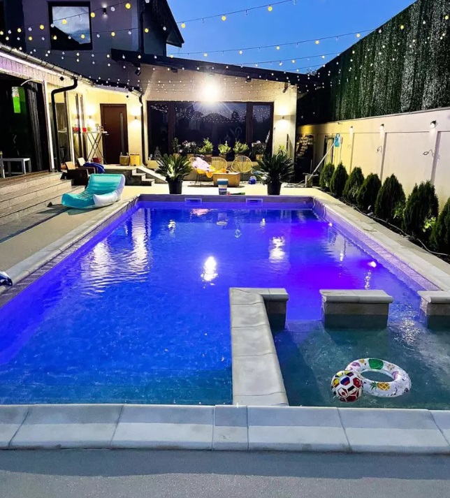 Imagini cu casa în care locuiesc Gabriela Cristea și Tavi Clonda. Voiau să vândă vila de lux, care are și piscină, cu 900.000 de euro