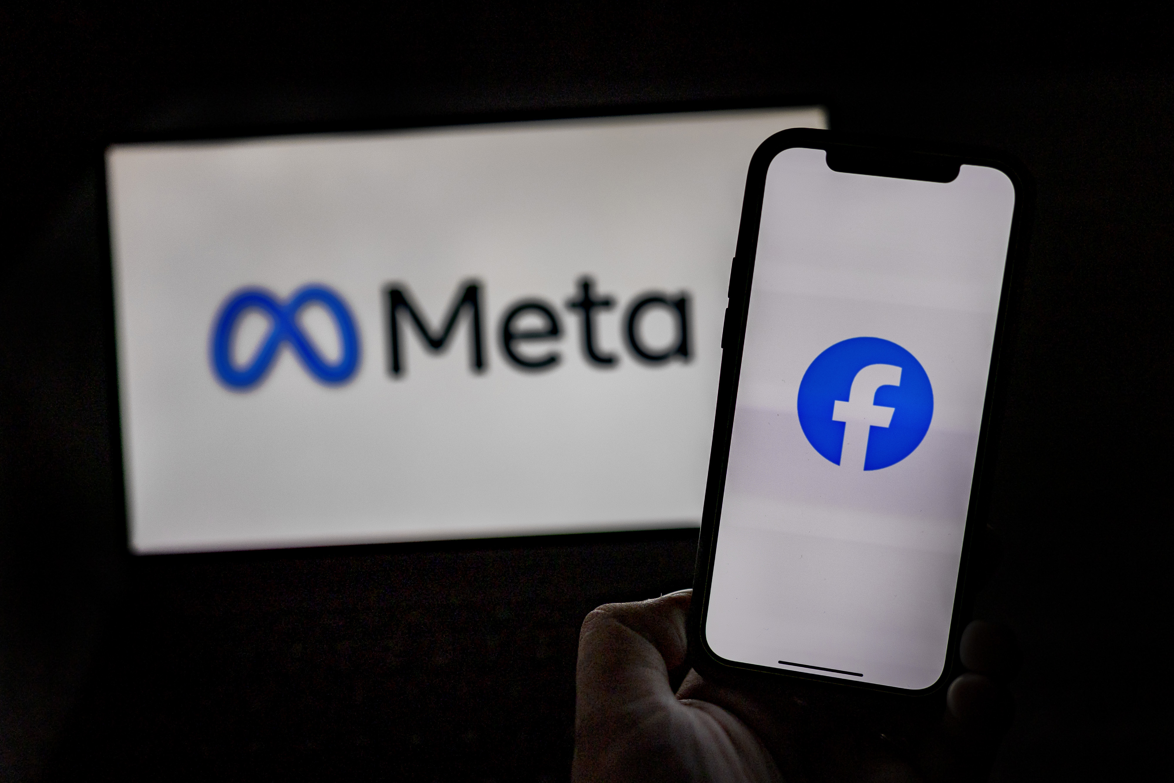 Meta and Facebook logos are seen on screens on Jan. 8, 2025, in Santa Rosa, Philippines. 