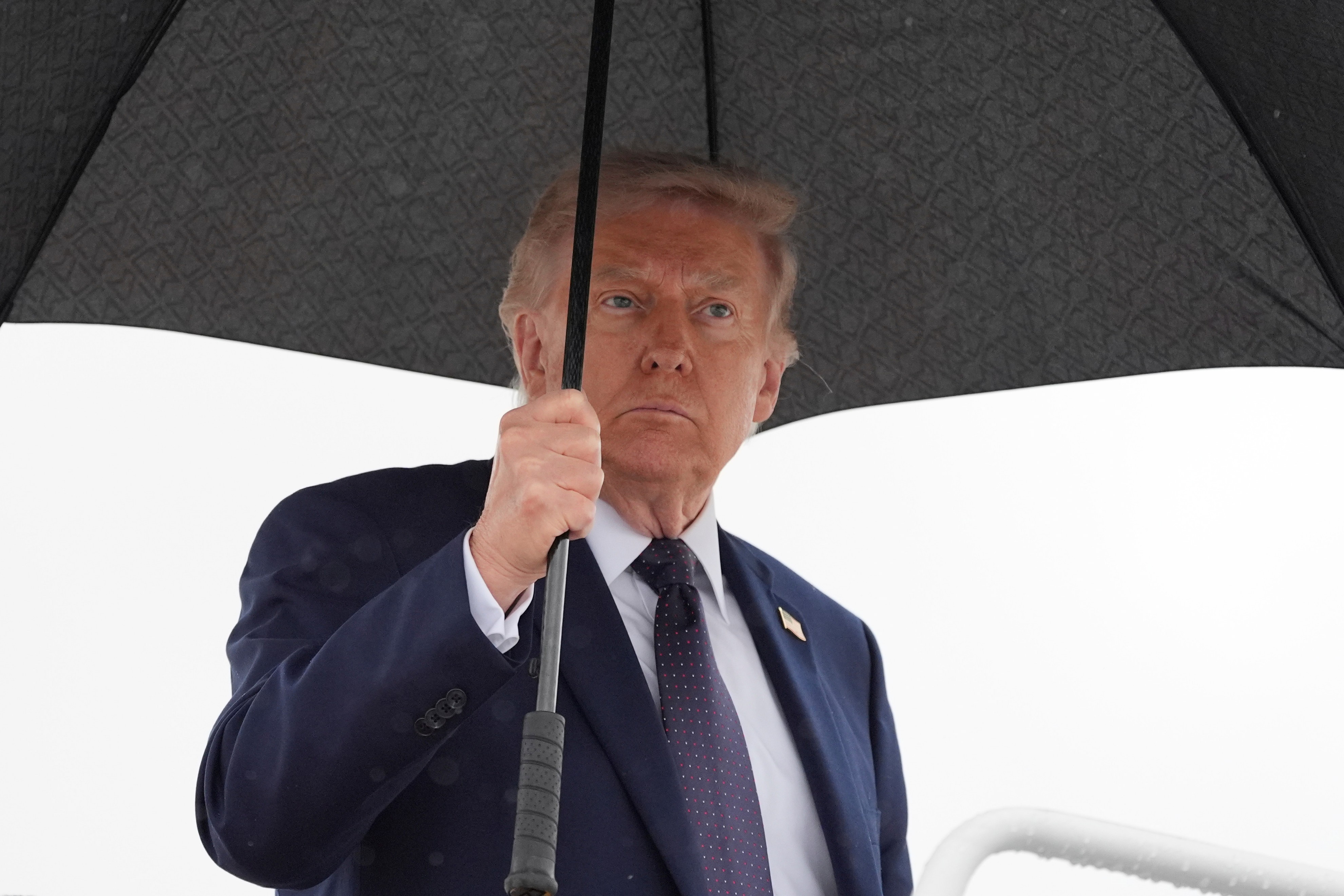 President Donald Trump boards Air Force One on Friday at Joint Base Andrews, Maryland.