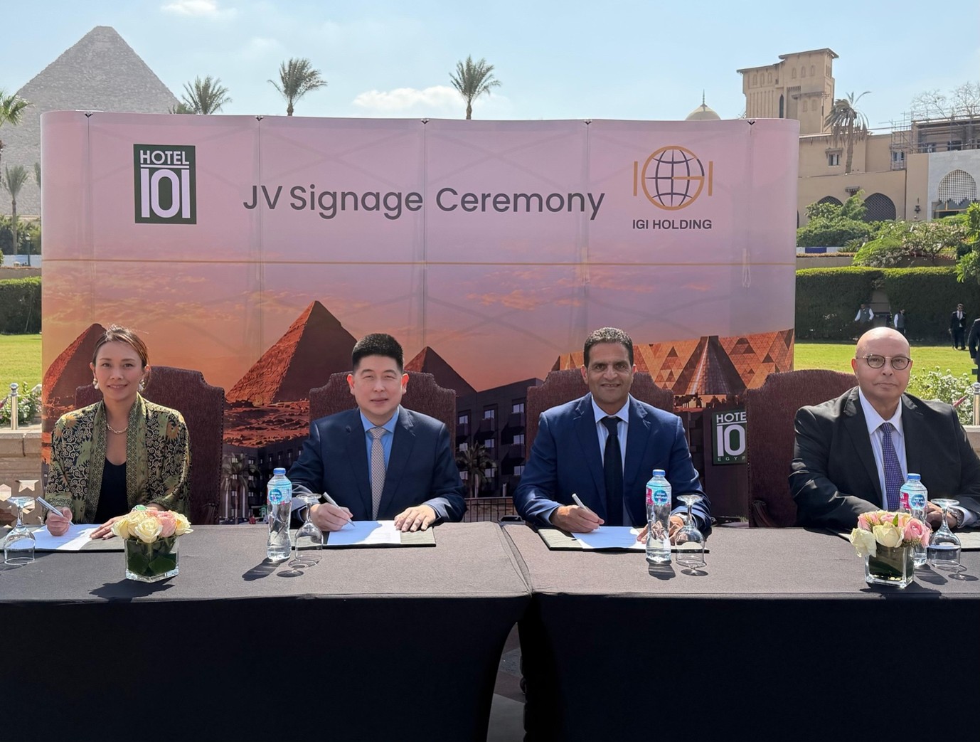 Hotel101 Founder Mr Edgar “Injap” Sia II and Mr Khaled Sheta of IGI Holding leads the Signing Ceremony with the world-famous Egypt Pyramids at the background. [Hotel 101]